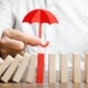Lifetime Capital Gains Exemption - umbrella protecting dominos