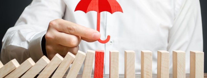Lifetime Capital Gains Exemption - umbrella protecting dominos